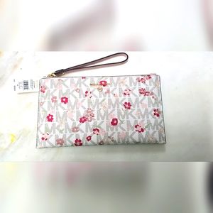 Michael Kors jet set charm large zip clutch wristlet